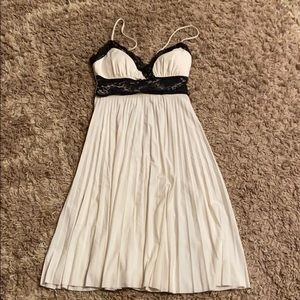 Fit and flare cream and black dress